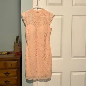 Salmon colored cap sleeved lace midi dress